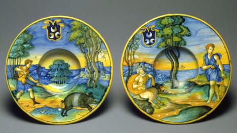 Two tondini depicting 'Meleager hunting the Calydonian Boar' (left) and 'The Contest between Apollo and Pan' (right), Urbino, c. 1530 